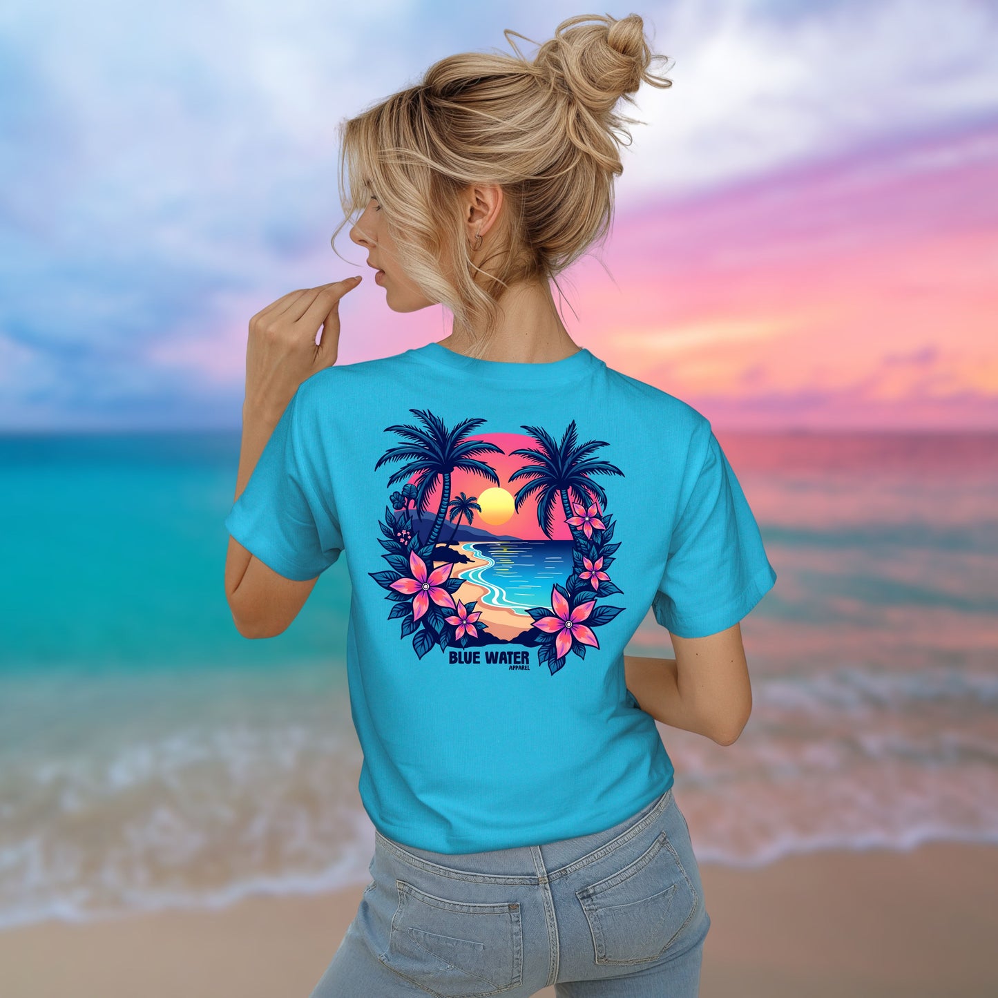 model on beach wearing turquoise tee by blue water apparel