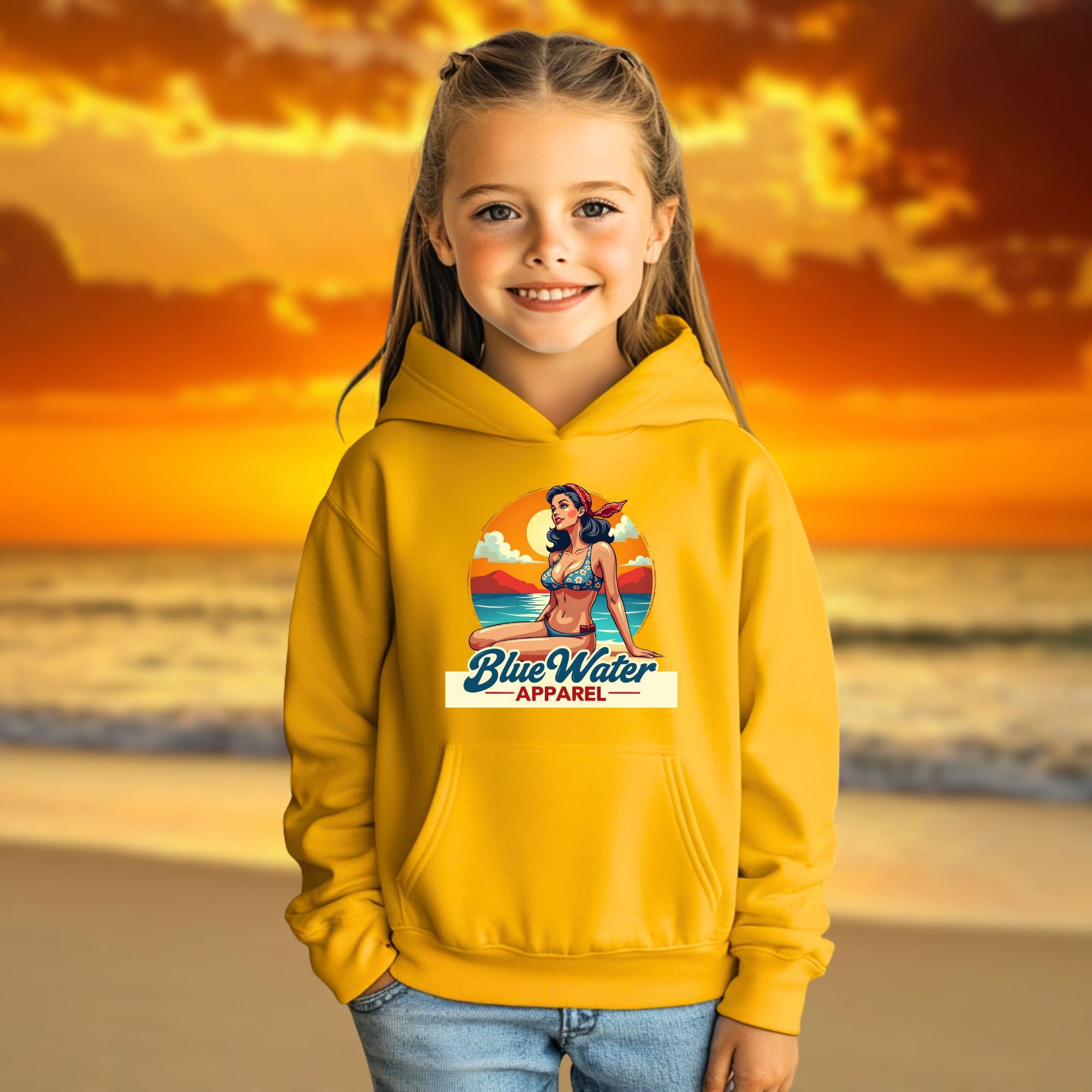 child model on beach wearing gold vintage pin-up kids hoodie by blue water apparel