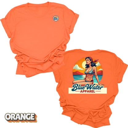 Flat lay tee in Orange of Vintage Pin-Up by Blue Water Apparel