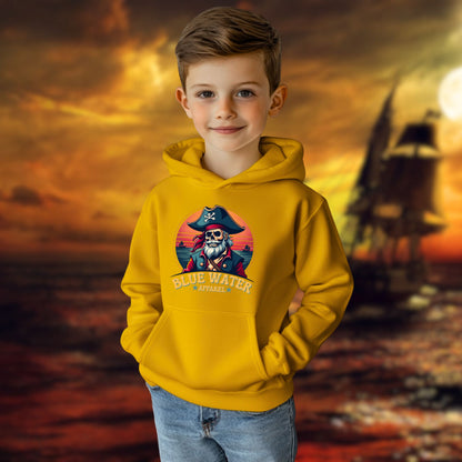 child model with pirate ship on open seas background wearing gold vintage pirate kids hoodie by blue water apparel