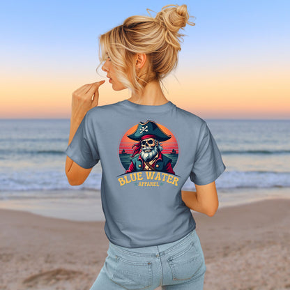 Model on beach wearing Steel Blue Vintage Pirate tee