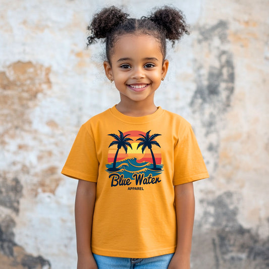 Child wearing a gold Vintage Sunset tee by Blue Water Apparel