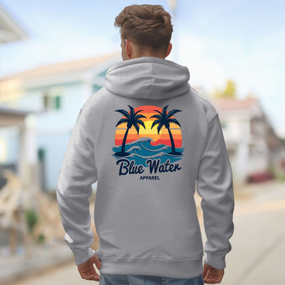 model in coastal neighborhood wearing sport grey vintage sunset hoodie by blue water apparel