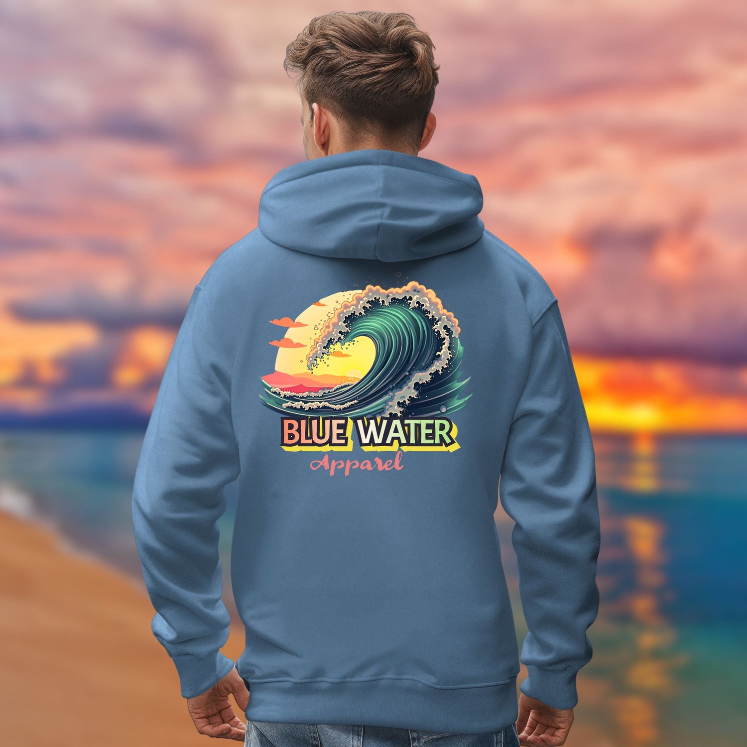 model on beach wearing indigo blue vintage surf hoodie by blue water apparel