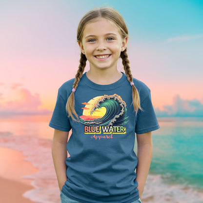 Female Model on beach wearing indigo blue vintage surf tee by blue water apparel